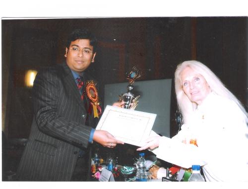 Dr. Tarang Krishna receiving award