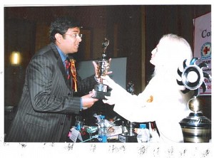 Dr. Tarang Krishna receiving International Hahnemann Award